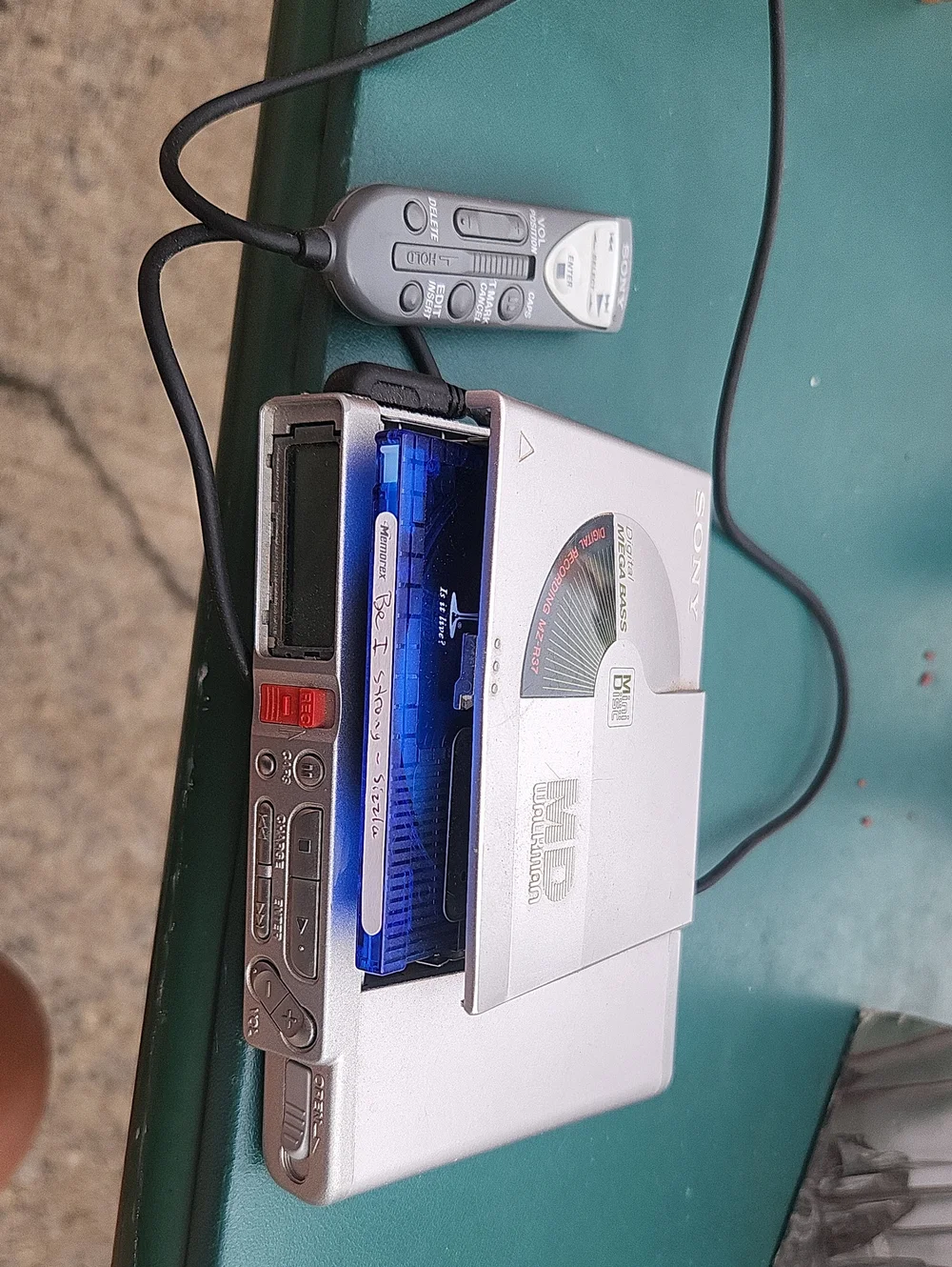 Sony Silver MiniDisc Walkman with Blue Disc Tray